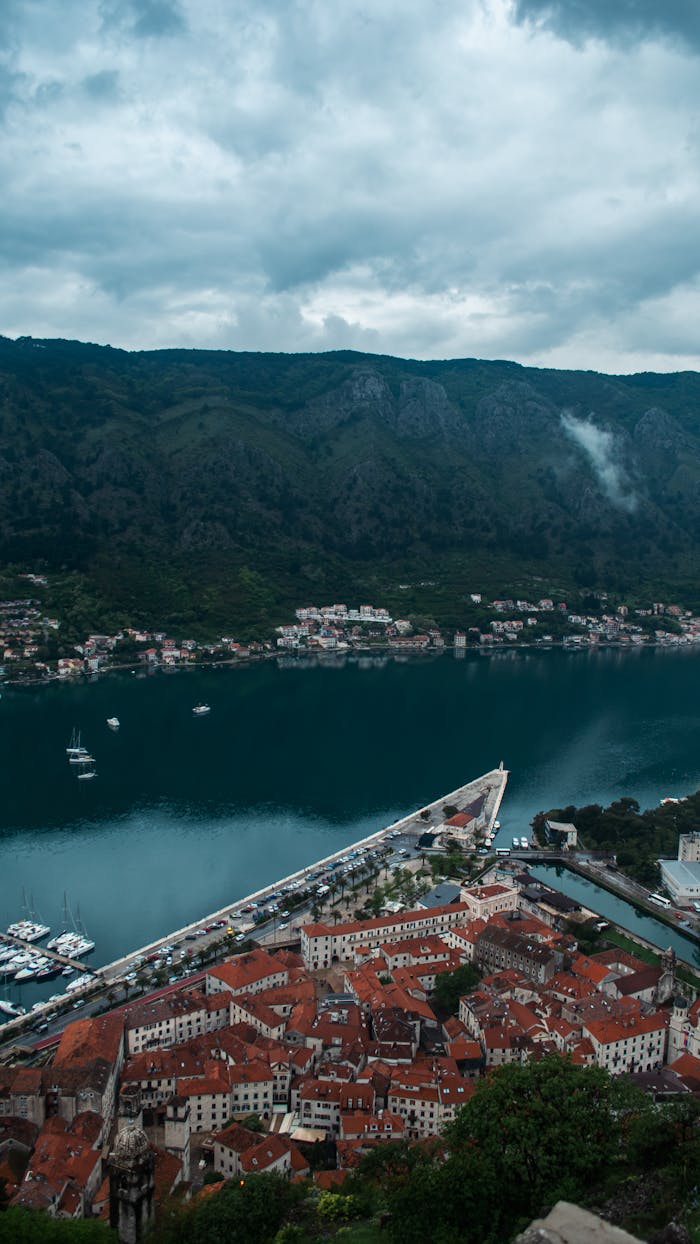 Stunning aerial view of Kotor's old town with mountains and bay.